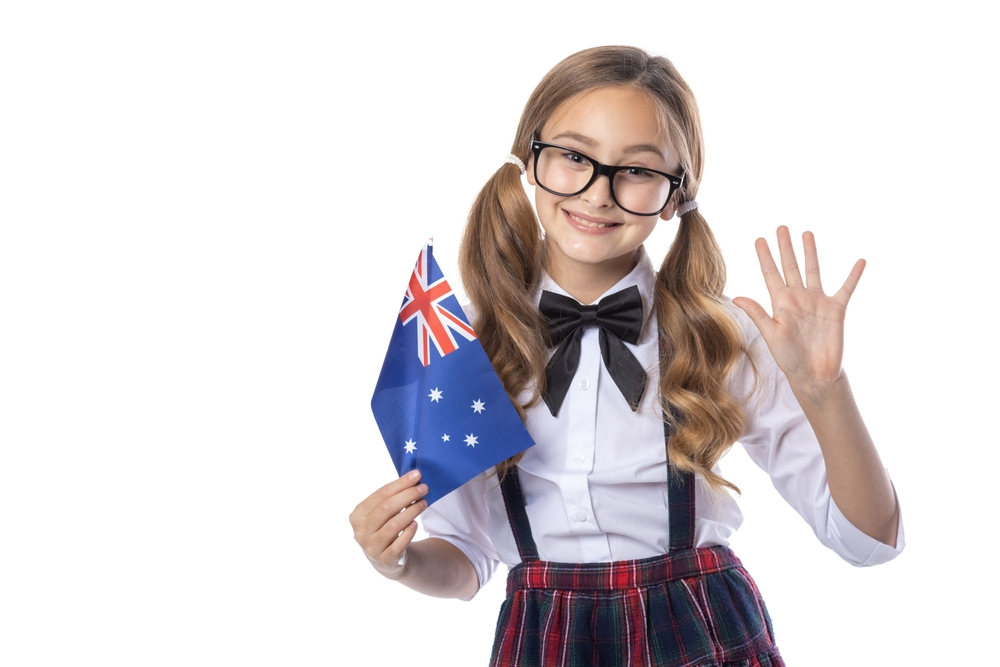 Ragazza adolescente tiene la bandiera australiana